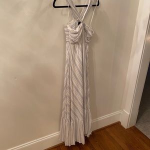 Vici criss cross neck ruffle bottom dress